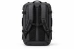 End view of ripstop duffel backpack showing zippered shoe compartment, air vents and side carry handle