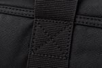 Custom embroidered duffle bags in black with white logo and padded shoulder strap