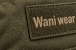 Close-up of box-X reinforced stitching and bar-tacked MOLLE webbing on Wani Wear tactical duffle bag