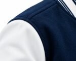 Navy wool body and white sleeve seam detail on custom team varsity jacket