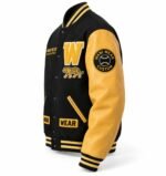 Side angle of black and gold letterman jacket with chenille W, tiger patch and Wani Wear baseball sleeve patch