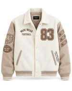 Custom wool varsity jacket with cream body, taupe sleeves, shirt collar and chenille number 83