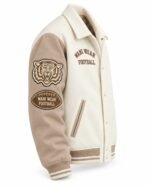 Collared letterman jacket with tiger mascot patch and football-shaped Wani Wear patch