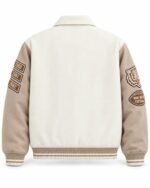 Back of cream wool varsity jacket with year bar patches and tiger sleeve patch
