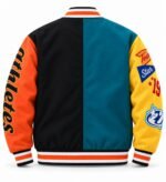 Back of patchwork varsity jacket with split teal and black body and oversized script sleeve lettering