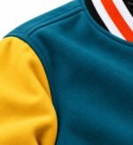 Teal wool body, yellow wool sleeve and striped rib collar detail on colorblock varsity jacket