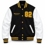 Black and white varsity jacket with black wool body, white leather sleeves and gold chenille number 82