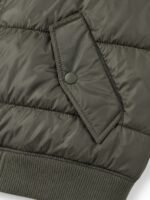 Snap-flap hand pocket and rib knit hem on quilted MA-1 bomber jacket