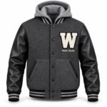 Custom hooded varsity jacket front view in charcoal wool with black leather sleeves and chenille W patch