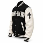 Black and white varsity jacket with gothic cross sleeve patch and silver snap buttons by Wani Wear
