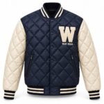 Custom quilted varsity jacket front view with navy diamond-quilted body, cream sleeves and chenille W patch