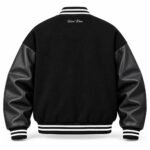 Black custom varsity jacket back view with embroidered script logo and striped rib trims