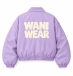 Custom cropped coach jacket back view with large 3D puff print Wani Wear logo
