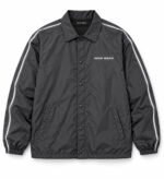Black custom coach jacket front with snap buttons, chest logo and side pockets