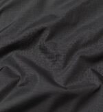 Black ripstop nylon fabric close-up for custom coach jacket manufacturing