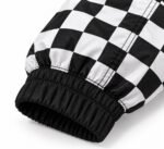 Elastic cuff and sublimated checkerboard sleeve on coach jacket