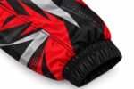 Custom sublimated coach jacket sleeve with red and black graphic and elastic cuff