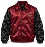 Burgundy satin coach jacket with snap buttons, embroidered chest logo and black contrast sleeves