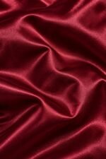 Premium burgundy satin fabric used for wholesale custom coach jackets