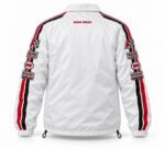 Back view of white racing coach jacket with twin racing stripes, sleeve patches and embroidered Wani Wear logo