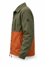 Side view of private label coach jacket with sleeve PVC patch, elastic cuffs and drawcord hem