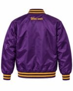Back view of purple custom satin jacket with gold embroidered logo and gold striped rib cuffs and hem