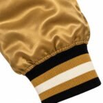 Black, gold and cream striped rib knit cuff on custom satin varsity jacket sleeve
