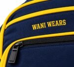 Close-up of embroidered Wani Wears logo with gold piping and black zipper on navy softball bat bag