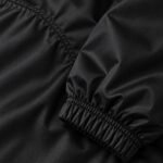 Black nylon windbreaker jacket elastic cuff and raglan sleeve stitching detail – Wani Wear