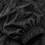 Women's cropped windbreaker close-up of vintage washed black nylon, sleeve seam and elastic cuff – Wani Wear